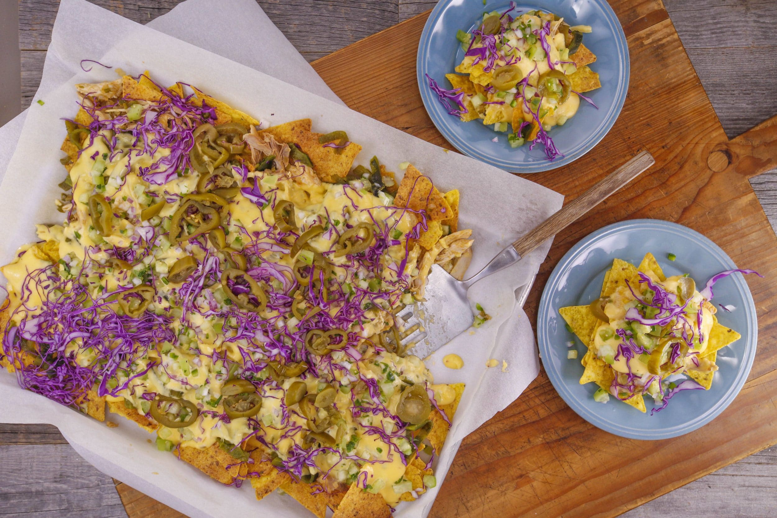 Poblano and Chicken Nachos with Queso and Raw Salsa Verde